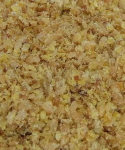Ground golden linseed close-up