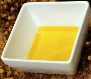 pure fresh cold-pressed linseed flaxseed oil