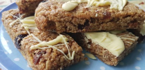Spiced Flaxjacks gluten-free with oats flax raisins and white chocolate
